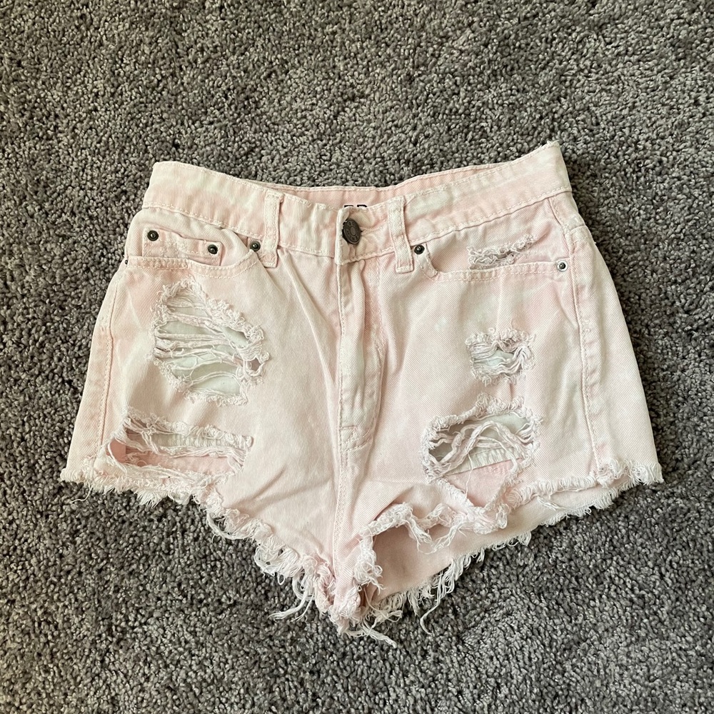 BDG high rise pink distressed shorts - size 26